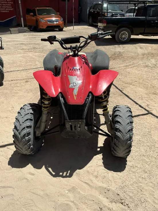Red single-rider ATV from the La Palapa rental fleet